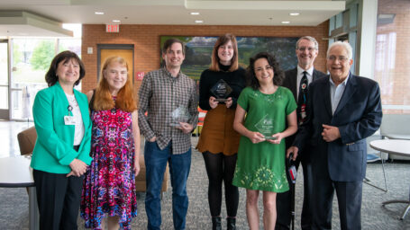 Group of faculty posing with the Mehta Award winners